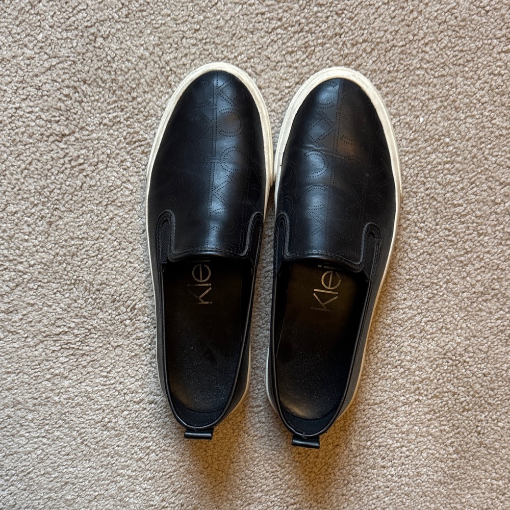 Calvin Klein Women’s Black and White Slip-On Loafers